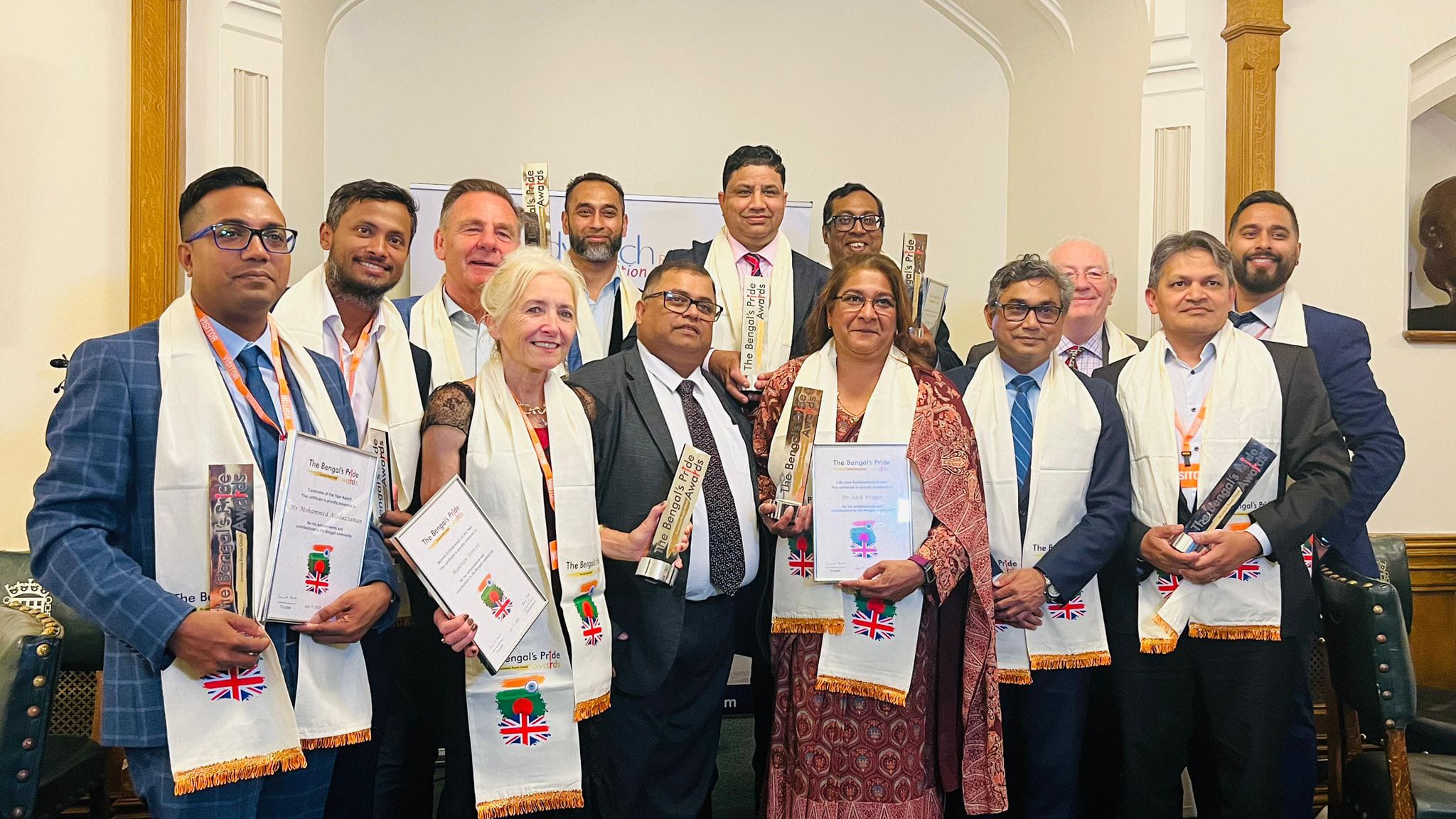 Naz Islam collecting the Bengal's Pride award at the House of Commons
