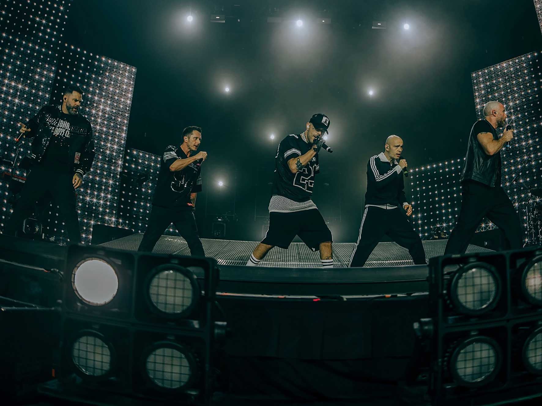 Five Performing Live on Stage
